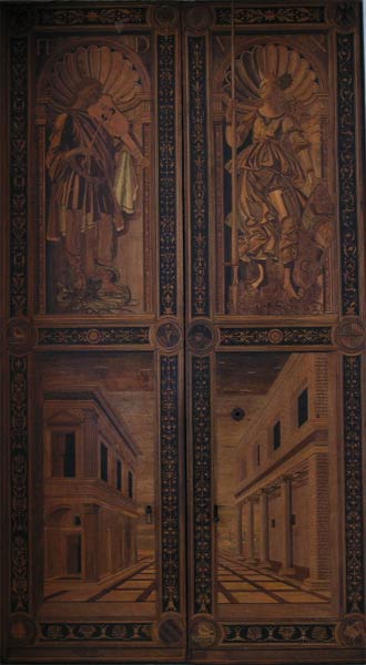 Intarsiated figures of Apollo and Minerva in the sala degli angeli.