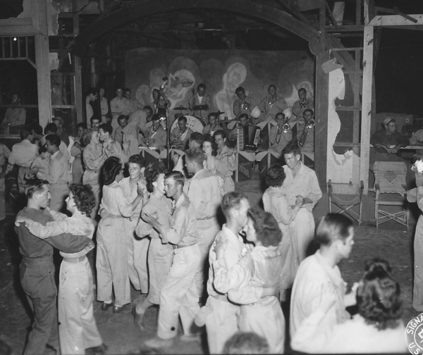 Wacs and GIs at a dance sponsored by the 43rd Infantry Division in the Philippines.