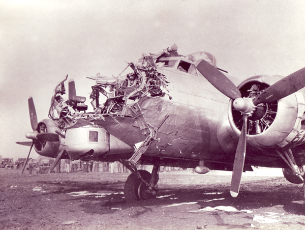 Flak from anti-aircraft guns protecting the German city of Cologne destroyed the nose of this B-17.